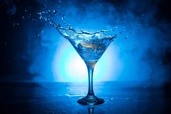 martini-cocktail-glass-splashing-on-600nw-1401538724.webp